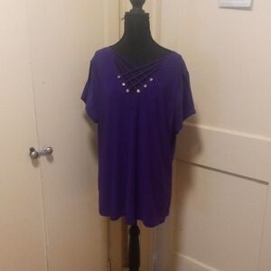 Source Unknown:  Plus size Cold Shoulder Blouse with Unique Accents